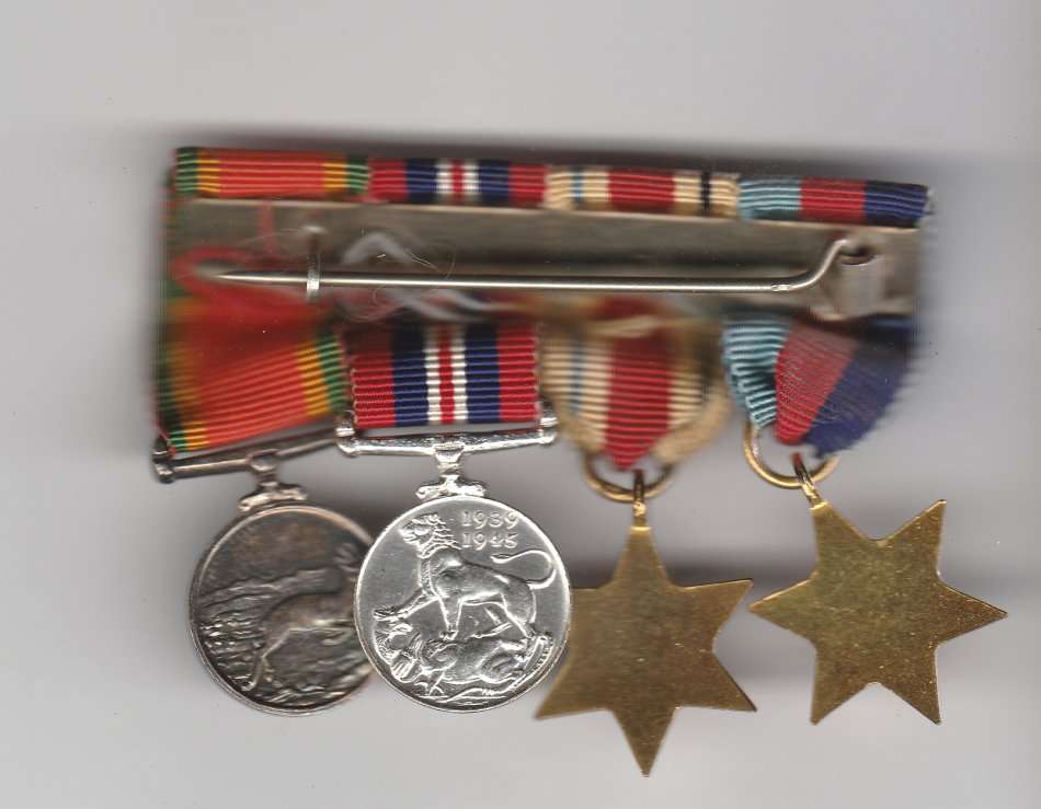 GROUP OF 4 MINIATURE MEDALS MOUNTED AS WORN - AFRICA STAR , 39-45 STAR , AFRICA SERVICE MEDAL