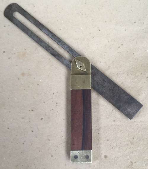 Vintage brass and rosewood bevel