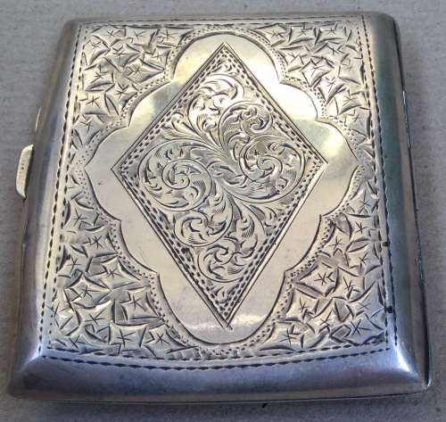 Brightcut cigarette case, pleasant curved shape. Birmingham silver marks