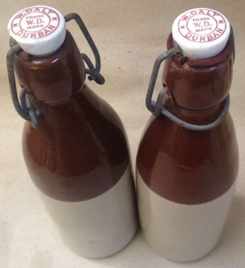 W. Daly stoneware bottles, one made by Barnett & Foster (5)
