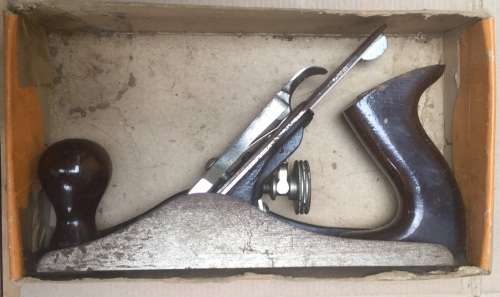 Stanley No. 4 smoothing plane, in original box. Well used with respect.