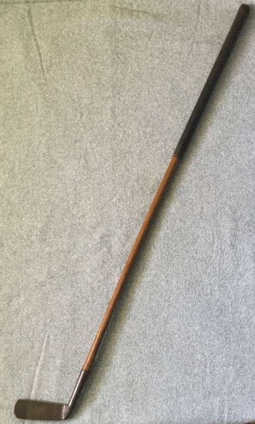 Antique hand forged hickory shaft putter...maker unclear...length to heel 86.5 cms