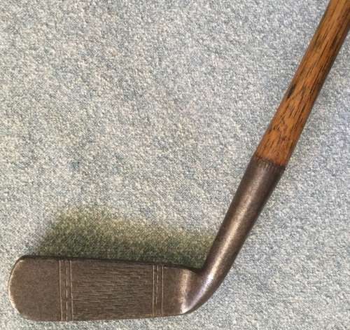 Antique hand forged hickory shaft putter...maker unclear...length to heel 86.5 cms