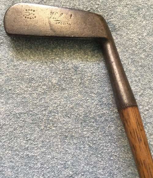 Antique hand forged hickory shaft putter...maker unclear...length to heel 86.5 cms