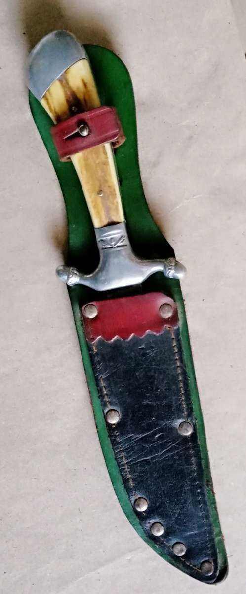 Vintage Puma hunting knife & scabbard