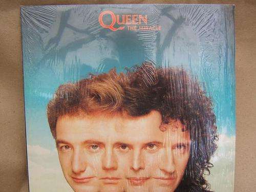 Queen....The Miracle.....cover and record v good....inner sleeve with great pic and lyrics