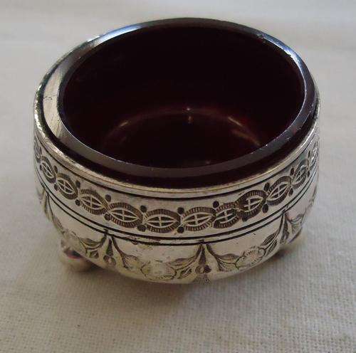 Lovely salter on bun feet with original ruby red glass