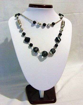 A LOVELY MULTI BEADED NECKLACE