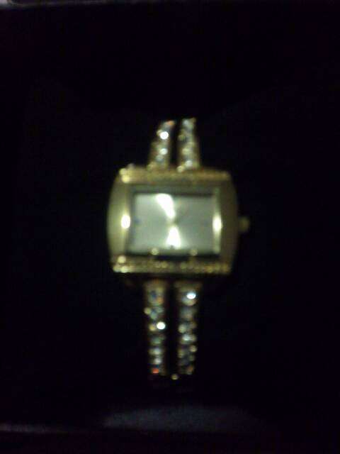 LADIES GOLD QUARTZ WATCH WITH DIAMANTES AROUND WRIST