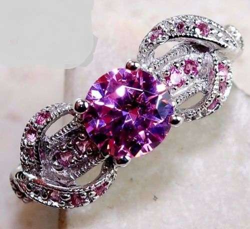 2 CARATS PINK SAPPHIRE, GENUINE 925 SOLID STERLING SILVER RING SIZE 7. ITEM IS STAMPED 925.