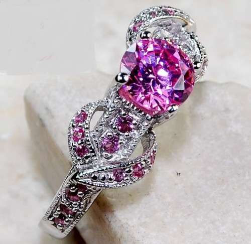 2 CARATS PINK SAPPHIRE, GENUINE 925 SOLID STERLING SILVER RING SIZE 7. ITEM IS STAMPED 925.