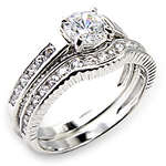 Kristin - 1.20ctw Gorgeous 2 piece wedding ring clad in white gold size 7 (size 8 also avail)