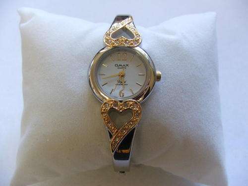 ***VERY LOVELY!!!***SWISS DESIGNED OMAX SILVER AND GOLD BANGLE WATCH WITH GENUINE CRYSTALS!!!!
