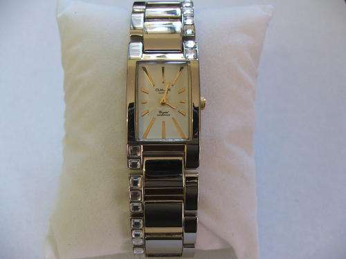 ***EXQUISITE!!!***SWISS DESIGNED OMAX SILVER AND GOLD WATCH WITH GENUINE CRYSTALS!!!