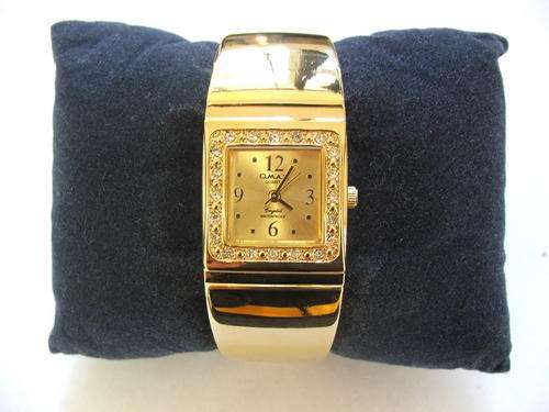 ***NEW!!!****STRIKING!!!***SWISS DESIGNED OMAX GOLD BANGLE WATCH WITH GENUINE CRYSTALS!!!
