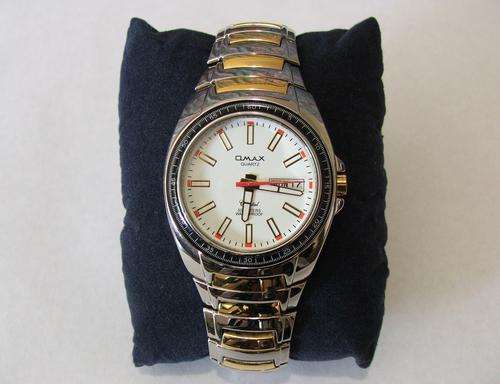 ***ABSOLUTELY STUNNING!!!***SWISS DESIGNED OMAX SILVER AND GOLD WATCH!!!