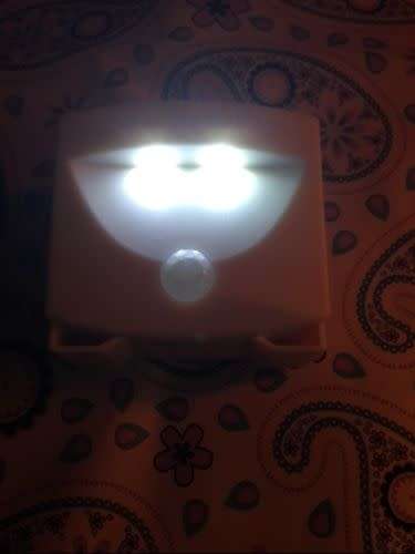 MIGHTY LIGHT - INDOOR/OUTDOOR - MOTION AND LIGHT SENSOR ACTIVATED - WHITE