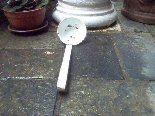 OLD WHITE ENAMEL LADLE.