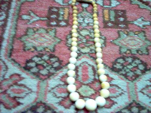 OLD STRING OF IVORY BEADS.