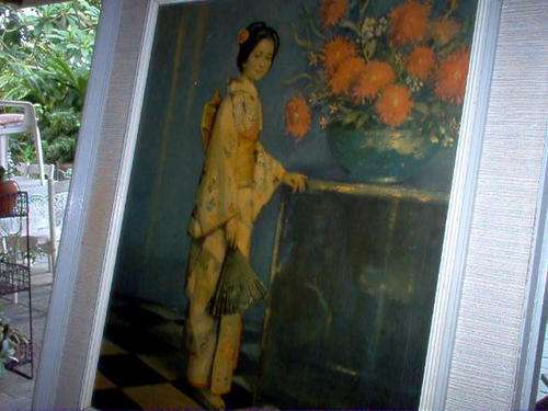 FRAMED PRINT OF GEISHA GIRL ADMIRING CRYSANTHS.