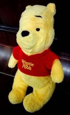 Disney Winnie the Pooh soft toy.  Cute as a Button!
