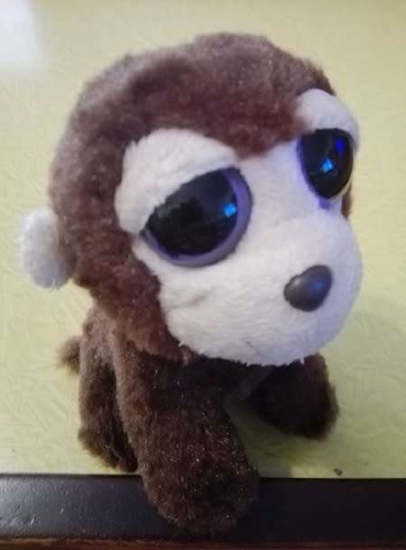 Minky the big eyed monkey.  Aurora Costa Rica plush toy.