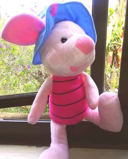 A lovely Piglet with a blue hat.  Plush toy!  Large 35cm.