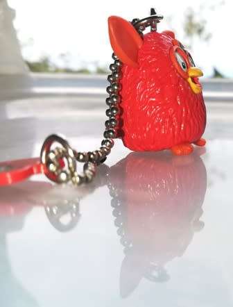 Collectable Small Furby key holder with chain.  Rare little toy!  3.5cm.