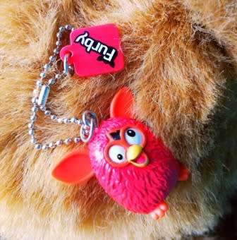 Collectable Small Furby key holder with chain.  Rare little toy!  3.5cm.