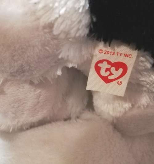 Retired and Rare. Cookie the glitter eyed dog by TY.  2013.  25cm.