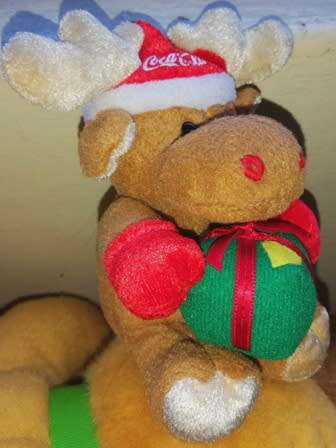 Collectable Coca-Cola Reindeer with Coke hat and green Gift! RARE Collectable. 15cm.