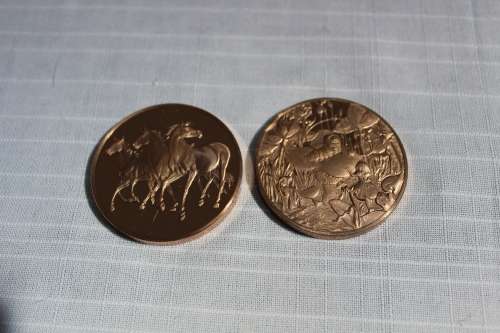 These 2 medallions were minted at the Franklin mint.....see details