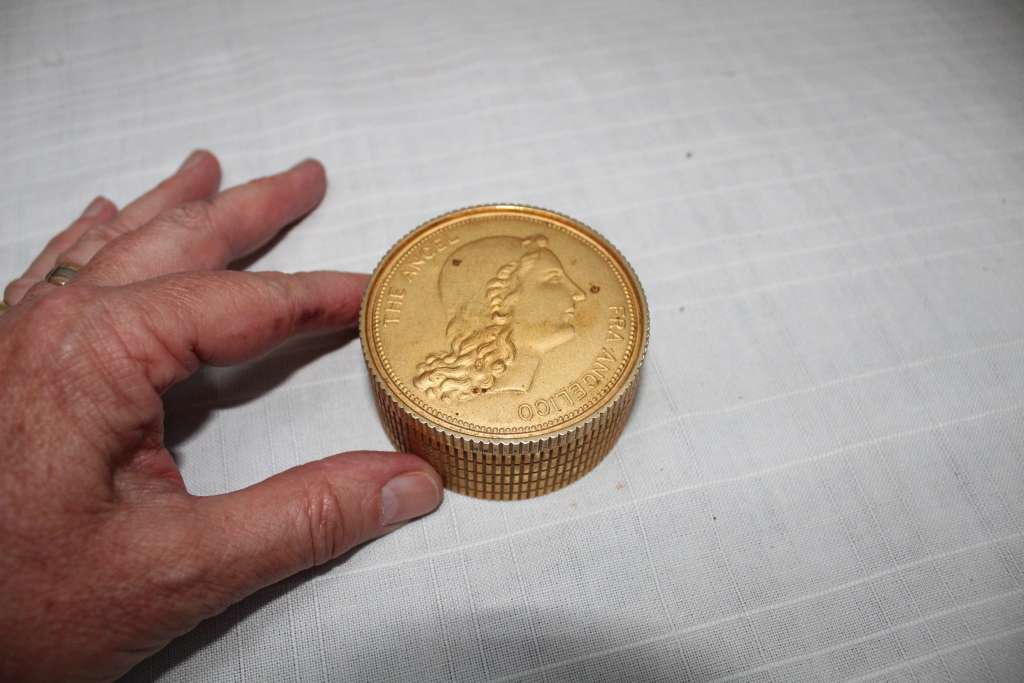 Unusual `coin` alarm clock