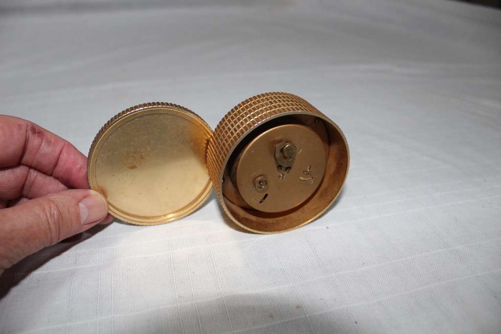 Unusual `coin` alarm clock