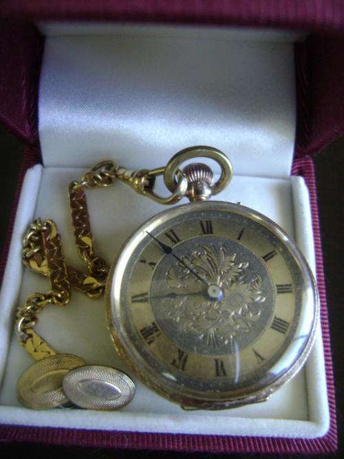 SOLID GOLD CASE SWISS LADIES WATCH