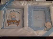 Stunning baby album and photo frame, beautifully presented in a gift box