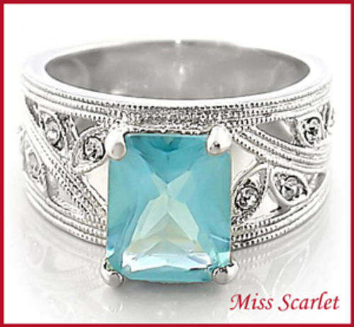 SIMULATED TOPAZ AND SIMULATED DIAMOND 18KT WHITE GOLD PLATED RING