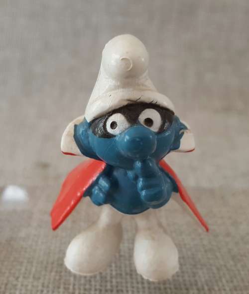 Four Vintage Smurfs, including highly collectable Astro Smurf &  Super Hero Smurf