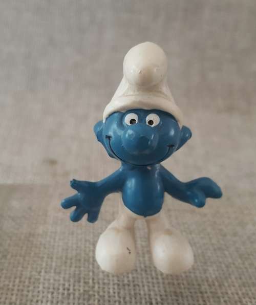 Four Vintage Smurfs, including highly collectable Astro Smurf &  Super Hero Smurf
