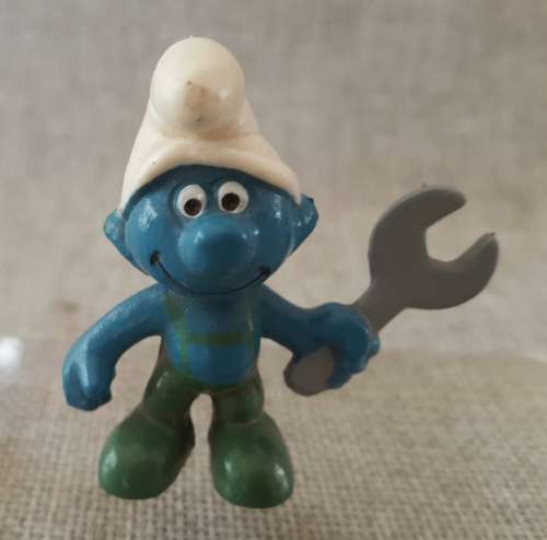 Four Vintage Smurfs, including highly collectable Astro Smurf &  Super Hero Smurf
