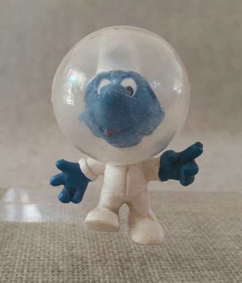 Four Vintage Smurfs, including highly collectable Astro Smurf &  Super Hero Smurf