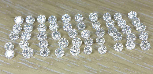 1.00ct Parcel, VS2 GENUINE round natural loose DIAMONDS 31 in this lot + 2.92ct Blood red RUBY OVAL