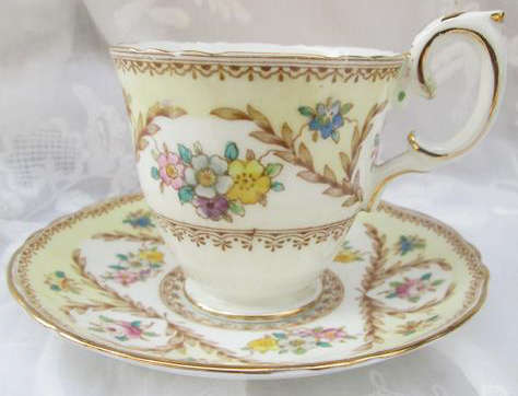VINTAGE STAFFORDSHIRE ENGLAND FINE BONE CHINA DUO, PRETTY FLORAL DESIGN WITH GILDING.