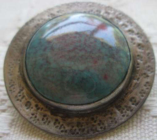 VINTAGE BROOCH WITH A PORCELAIN CENTRE SET IN PEWTER ??