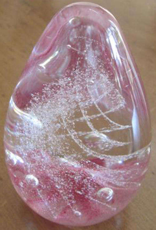 VINTAGE EGG SHAPED  PAPERWEIGHT IN DELICATE SHADES OF PINK SWIRLS AND BUBBLES