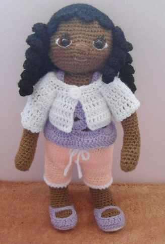 Dress up crocheted doll.