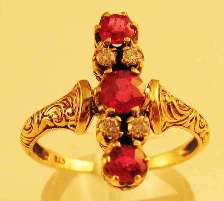 Genuine Rubies  and Diamonds in 9ct Gold Ring