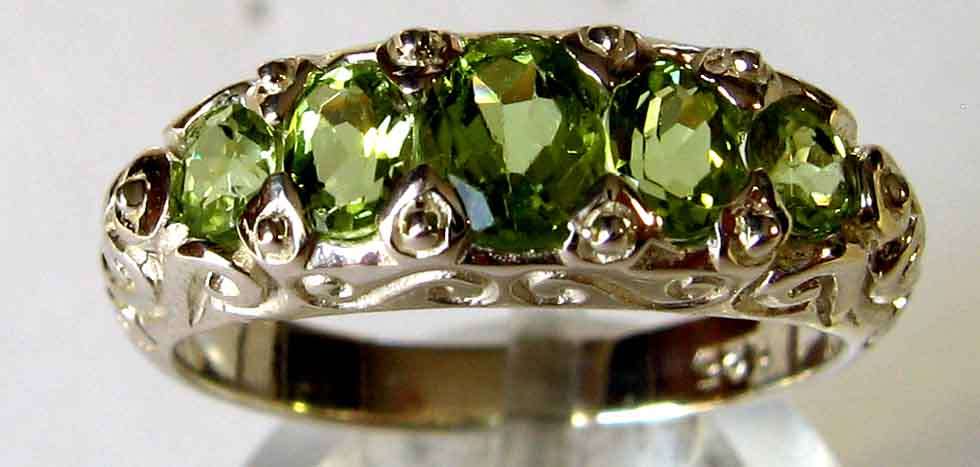 Lovely, Sterling Silver and  Genuine  Peridots  Ring.