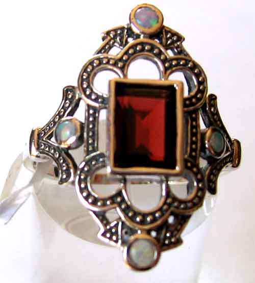Genuine Opals and Garnet  in Sterling Silver Ring.