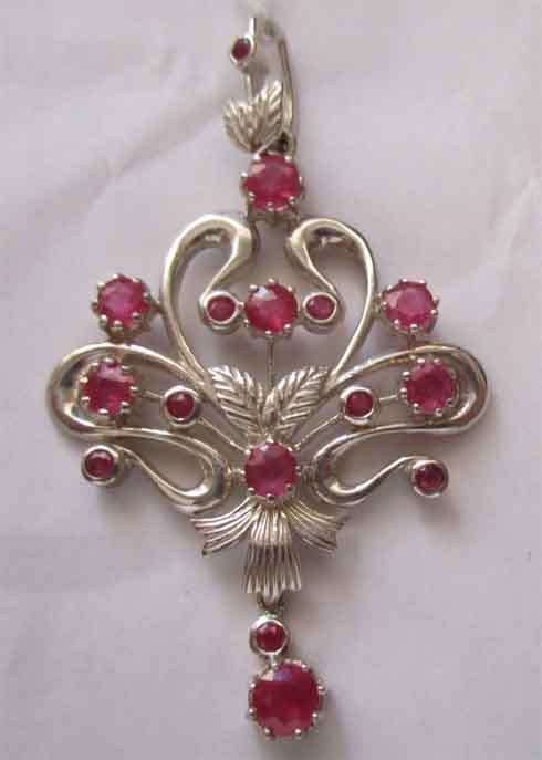 Beautiful Sterling Silver and genuine Rubies Pendant